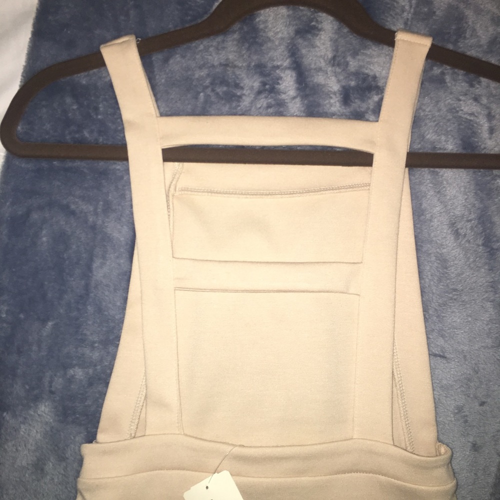 NEVER WORN!! Beige bodysuit